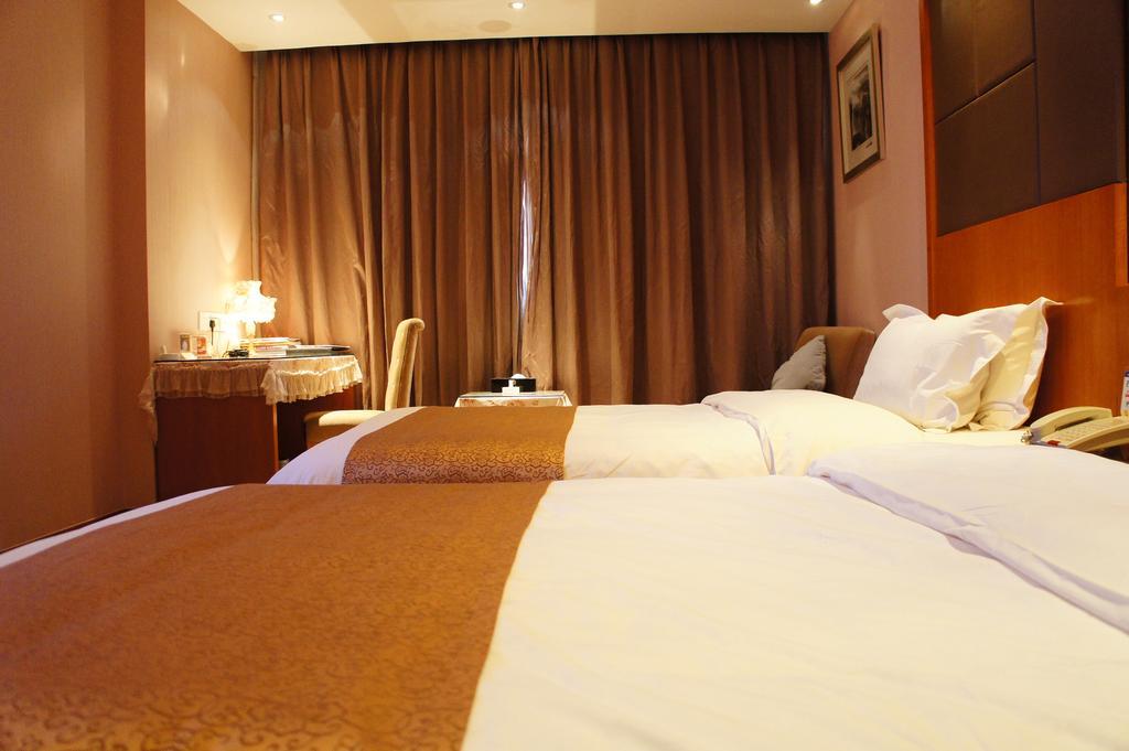 Oriental Hotel Tong Xiang Ťia-sing Pokoj fotografie