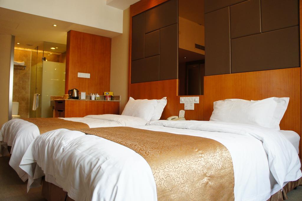 Oriental Hotel Tong Xiang Ťia-sing Pokoj fotografie