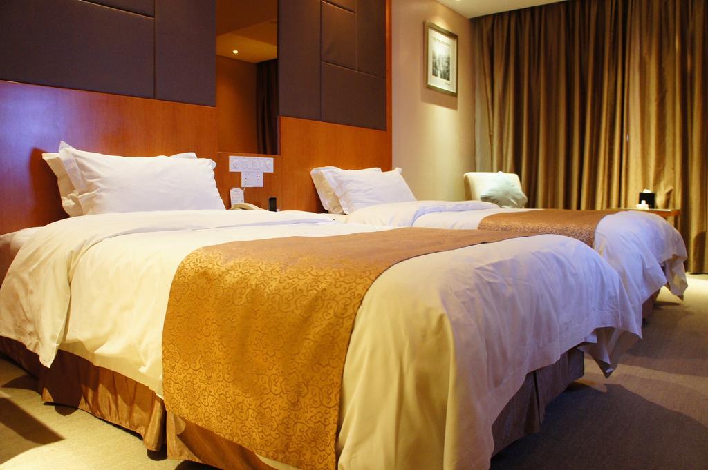 Oriental Hotel Tong Xiang Ťia-sing Pokoj fotografie